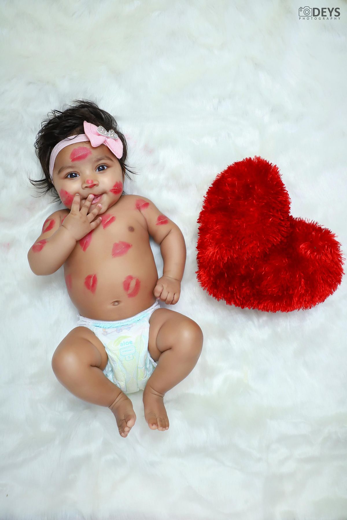 Baby shoot with kisses and heart