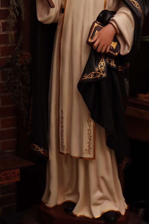 Overview of the custom, hand-painted trim on the restored statue of St. Rose