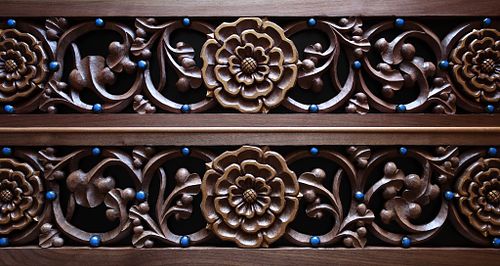 wood carving of roses vines and beads for gradines on the high altar at St. Bernadette Catholic Church in Lancaster, Ohio