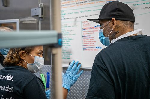 Indoor scene at Homeboy Industries during the pandemic — photojournalism by David Andrade, Los Angeles