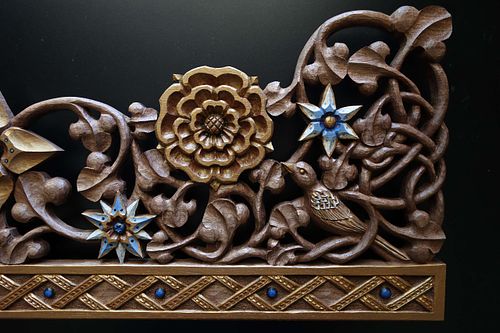 Carved sparrow, squill, borage, rose and vines on tabernacle crown