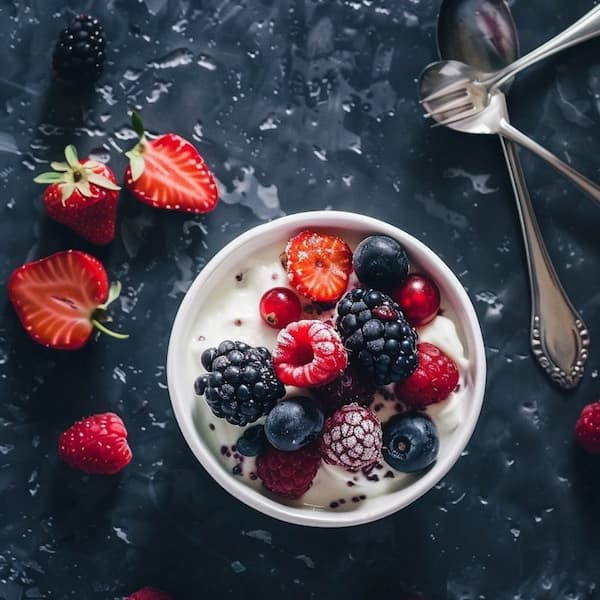 bowl with yogurt and mixed berries