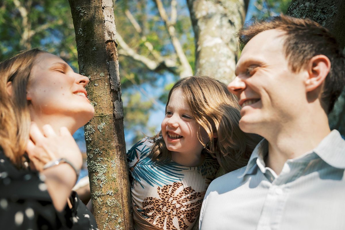 A family near a tree in Chapel Hill, NC