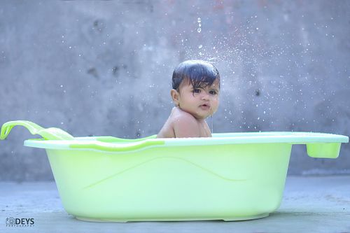 Baby shoot Noida in bathtub