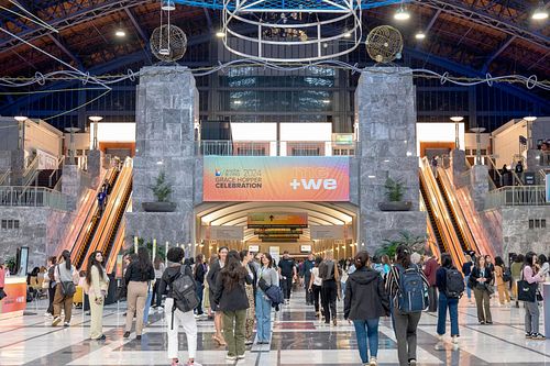 Attendees entering the Pennsylvania Convention Center for the 2024 Grace Hopper Celebration in Philadelphia, major tech conference focused on innovation, diversity, and inclusion, captured by professional event photographer.