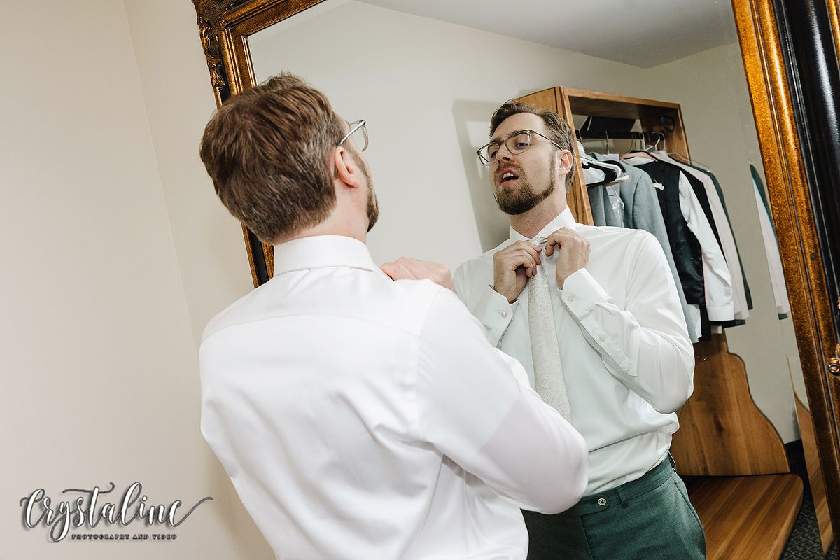 Groom getting ready at Willow Ridge Manor