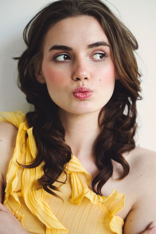 Portrait with bold, vibrant colours in Poznań, cinematic style and minimal composition