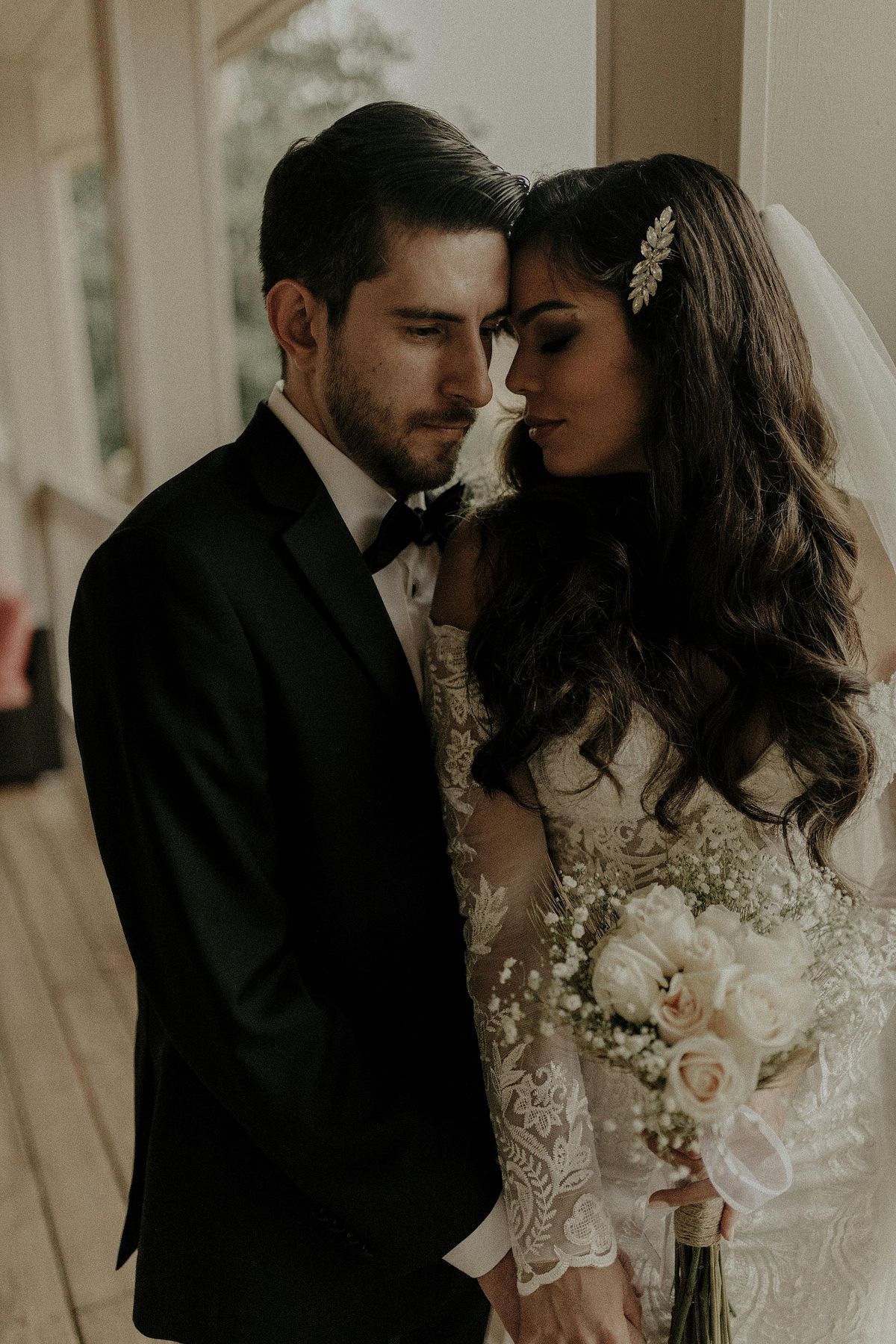 Bride and groom sharing a moment on their wedding day.