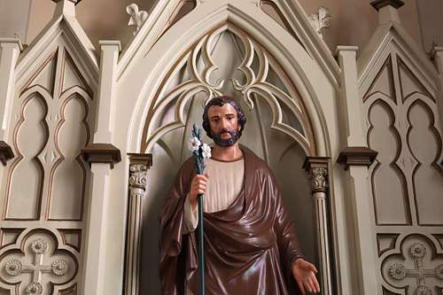 Beautiful statue of Saint Joseph in the side altar reredos