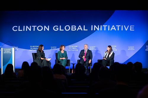 Panelists speak on stage at the 2024 Clinton Global Initiative Annual Meeting during a spotlight session on digital equity and education access.