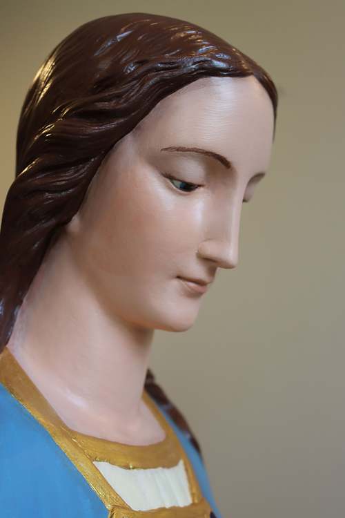 Statue of Mary's face after restoration