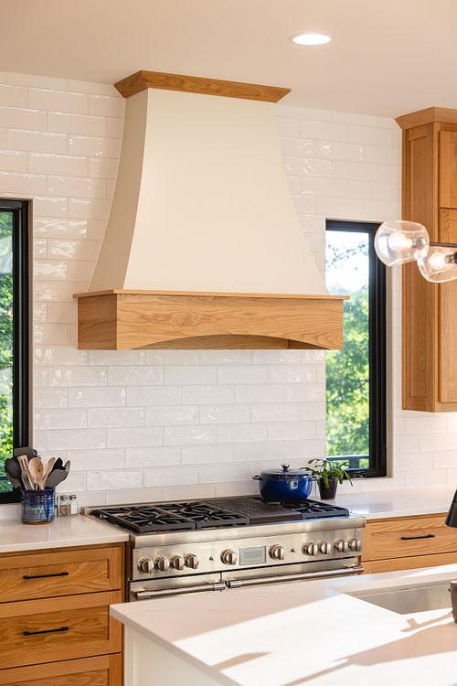 Hood over range with windows on both sides