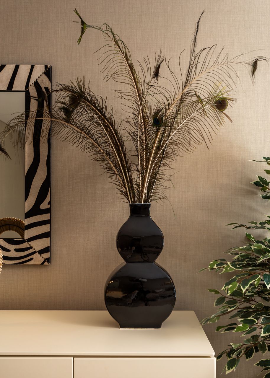 Fotografia de no Apartamento Montijo, destacando a decoração com Estilo Africano.