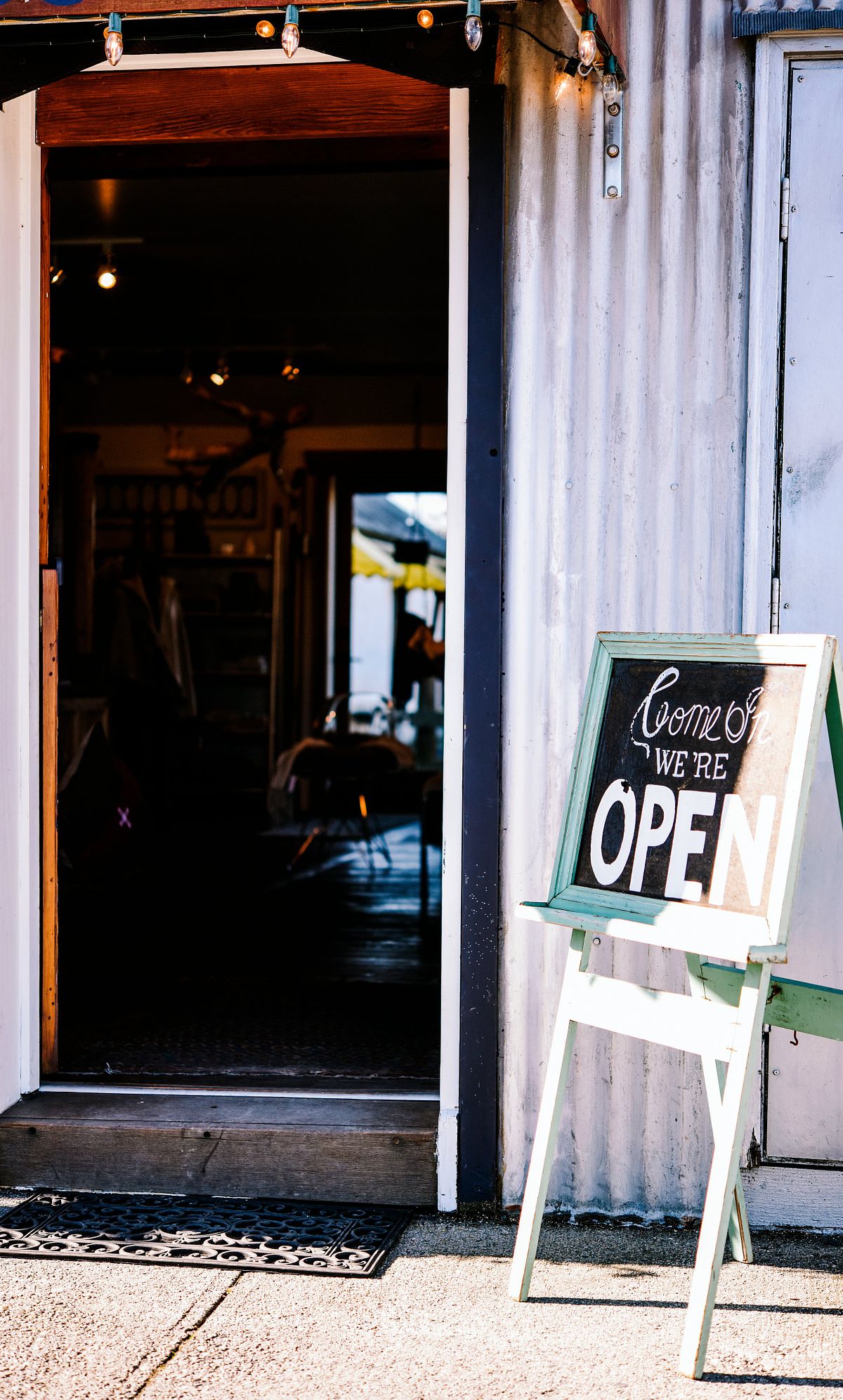 Shop entrance with open sign, visual branding for small businesses and retail