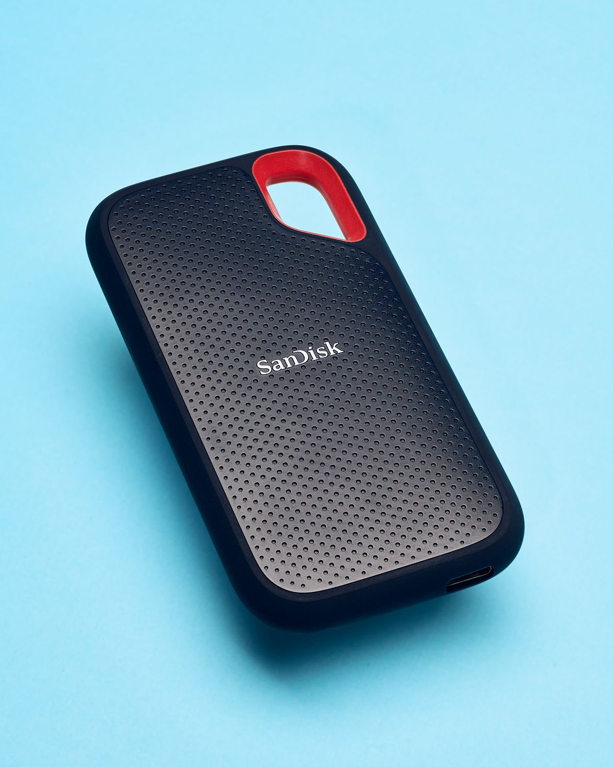 Blue and orange external solid state drive.