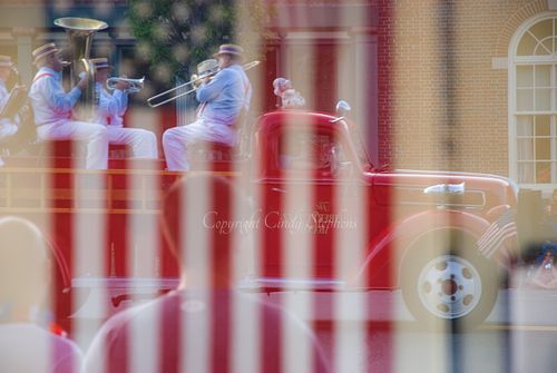 Fourth of July parade capturing civic pride and community spirit in a small town.