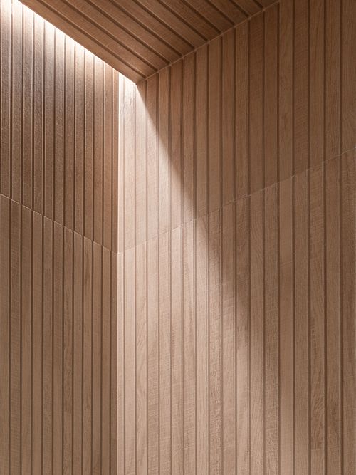 Soft light casting shadows on geometric shapes and natural textures – Columna project