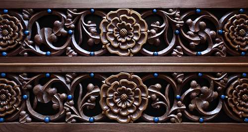wood carving of roses vines and beads for gradines on the high altar at St. Bernadette Catholic Church in Lancaster, Ohio