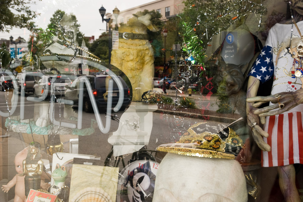 Collection of eclectic oddities and reflected Salem MA main street
