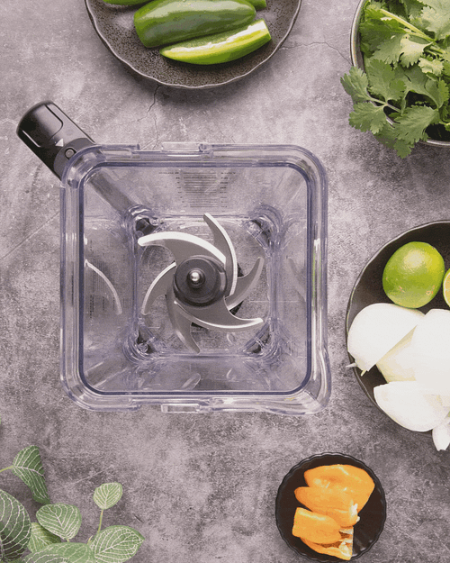 Stop motion animation of green chutney in a blender