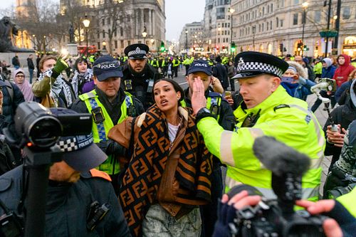Pro-Palestine protesters gather in Trafalgar Square after the end of the rally in Whitehall, London, UK