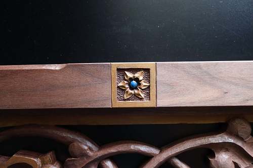hand-carved and polychrome painted small star of bethlehem flower