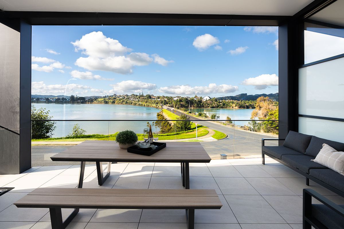 Architectural photography of a modern balcony overlooking the Raglan estuary by Flax Cove Studio.