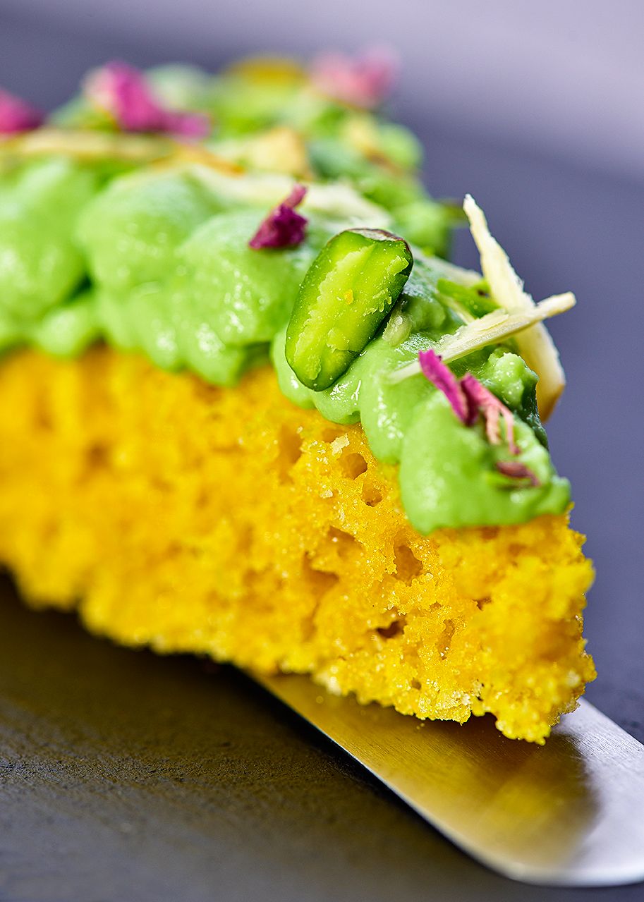 Food Photos : closeup of corn bread topped with green dressing