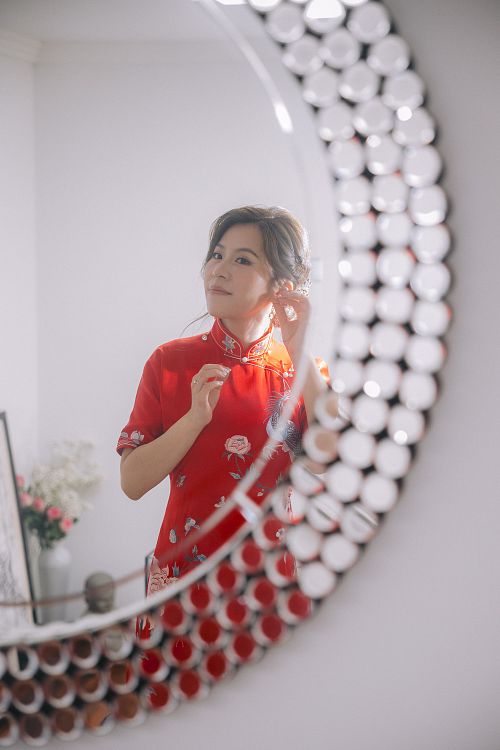 Chinese bride getting ready for traditional tea ceremony