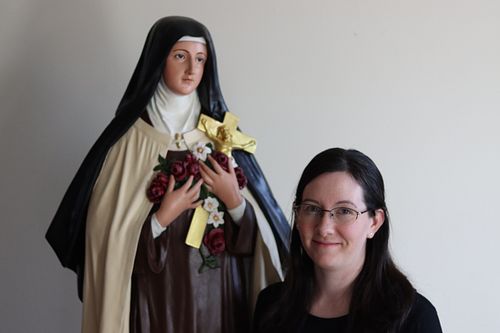 St Therese statue with Kelly Baker