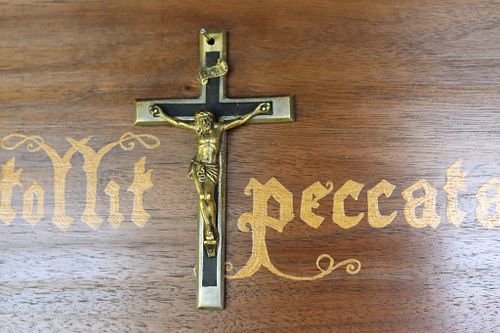 detail of the crucifix and the hand painted lettering on the reredos