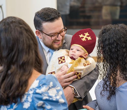 baby baptism ceremony at Ottawa church captured by Kameel Photography