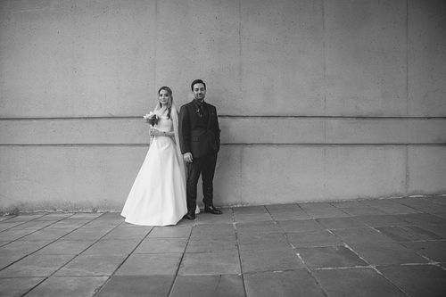 Cinematic portrait of bride and groom on a rainy spring day in Vancouver