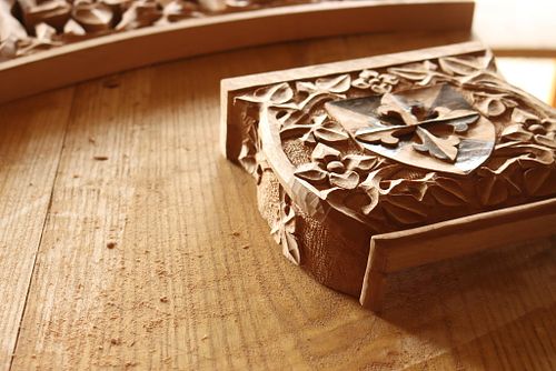 hand carved capital with Dominican Shield for Sisters' chapel